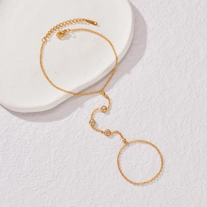 Bracelet bague élégant en acier inoxydable doré avec trois oxydes de zirconium ronds