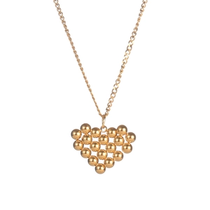 Collier vintage français avec pendentif cœur doré perlé sur une fine chaîne à maillons