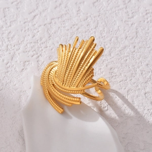 Golden stainless steel ring featuring a radiant sunburst texture and layered open band design