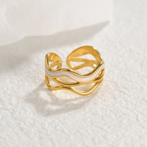 Gold layered wave open ring with white enamel inlay and 18K gold plated stainless steel