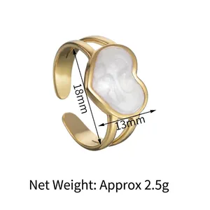 Bague ouverte minimaliste en or mat avec relief de visage cœur blanc et double anneau