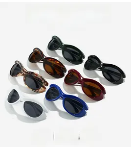 Collection of retro cat-eye sunglasses in multiple colors with high-gloss thick frames