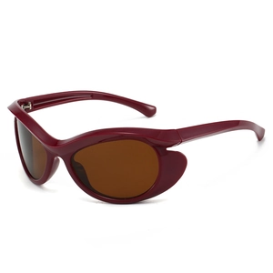 Retro burgundy cat-eye sunglasses for women with wide frames and dark amber lenses
