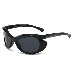 Chic black cat-eye bat-wing sunglasses with dark lenses and oversized frames for women