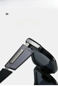 Detail showing high-quality metal hinges and glossy black frame of modern sunglasses