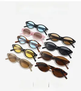 Matrix display of vintage oval sunglasses in various colors with retro frames