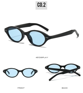 Detail view of oval sunglasses with black frames, blue lenses and silver rivets decoration
