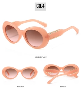 Trois angles de lunettes de soleil ovales rétro en rose pêche à verres dégradés