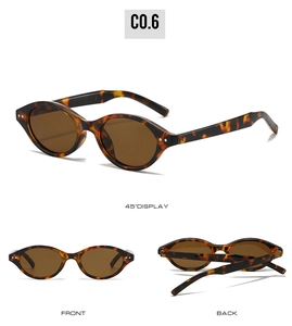 Detailed views of vintage tortoiseshell sunglasses with dark brown lenses and silver studs
