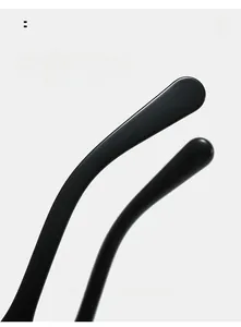 Detail of black ergonomic temple tips of oversized sunglasses for comfortable wearing