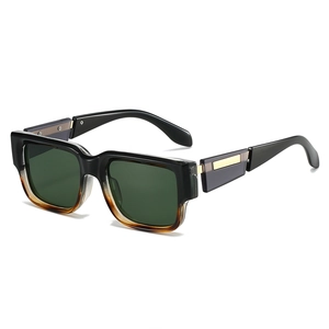 Retro square sunglasses with dark green lenses and black-to-amber gradient thick frames
