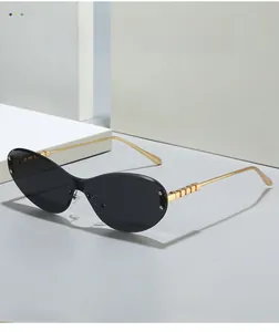 Detailed macro view of gold metal temples with luxury 3D square cube design accents