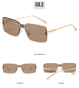 Detail view of rimless square sunglasses with brown gradient lenses and gold chain temples