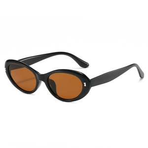 Minimalist oval sunglasses with black frames and polarized amber lenses on white background