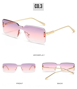 Detail view of rimless square sunglasses with purple gradient lenses and gold metal temples