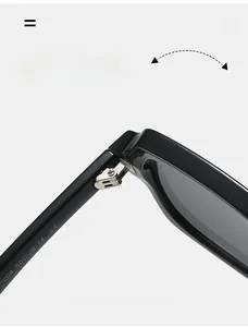 Detail of durable metal hinge and CE certification stamp on black square sunglass frames