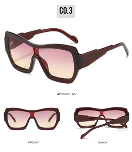 Detail view of burgundy oversized shield sunglasses with gradient pink to yellow lenses