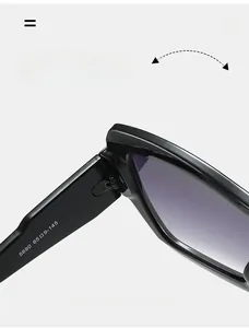 Detail of durable textured hinge and specifications on black square sunglasses frame