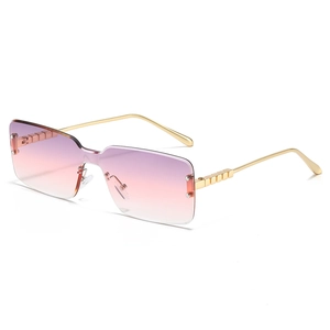 Rimless square sunglasses with gold metal temples and purple gradient lenses