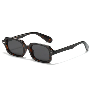 Vintage rectangle sunglasses with dark tortoiseshell frames and silver rivet accents