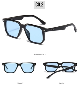 Detail view of square sunglasses with silver rivets and light blue translucent lenses