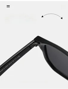 Macro detail of high-quality metal hinges and size specs on black square sunglasses