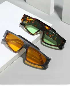 Close-up of irregular oversized sunglasses ZN3900 with tortoiseshell and transparent frames