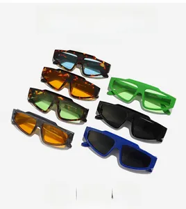 Collection of geometric sunglasses in tortoiseshell, green, and blue with waterproof lenses