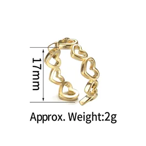 Gold hollow heart-shaped stainless steel ring with 17mm diameter and 2g weight details