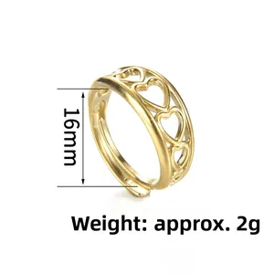 Detail view of gold heart ring with 16mm inner diameter and 2g weight specs