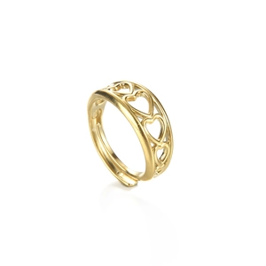 Detailed close-up of golden hollow heart ring with adjustable open band design