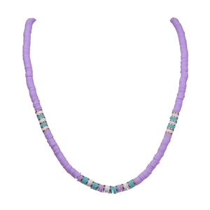 Macro view of lavender Heishi clay beads necklace with gold and turquoise accents