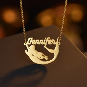 Gold stainless steel mermaid name necklace featuring Jennifer pendant on fine O-chain