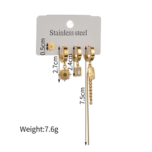 4-piece gold stainless steel earring set with starburst studs and cubic zirconia charms