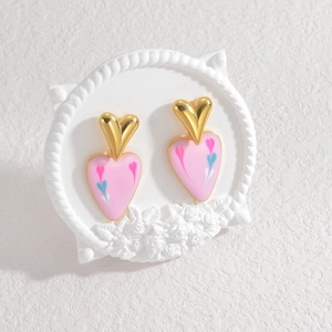 Elegant gold heart earrings with pink enamel and colorful fluid lines on white background
