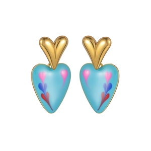 Detail of layered gold and sky blue heart earrings with colorful enamel patterns