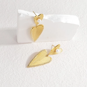 Golden double heart drop earrings with white pearls and sparkling crystal trim