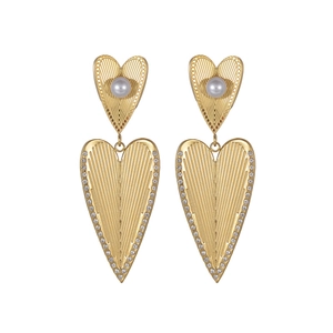 Golden heart drop earrings with white pearls and sparkling crystal border in minimalist style
