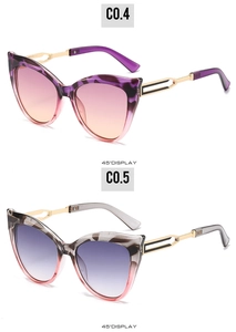 Detailed 45-degree view of two cat-eye leopard sunglasses with gradient lenses