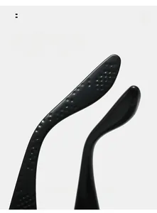 Detail of curved ergonomic black sunglass temples with anti-slip texture for comfort