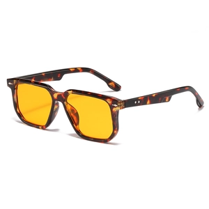 Classic tortoise shell square sunglasses with yellow lenses and metal rivet accents