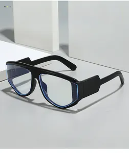 Detailed shot of thick glossy black oversized frames with blue light blocking lenses
