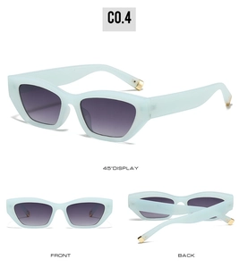 Detailed views of mint green cat-eye sunglasses with gradient lenses and gold accents
