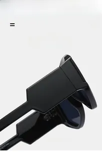 Detail of wide black glossy temples on modern oversized sunglasses with stable structure