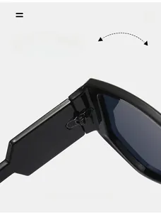 Macro detail of the durable metal hinge on black oversized fashion sunglasses