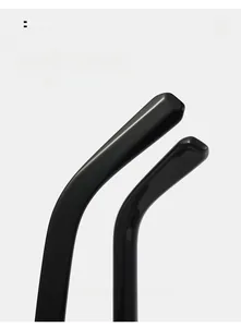 Detail view of glossy black curved temple tips designed for ergonomic comfort fit