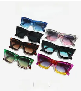 Flat lay of retro square sunglasses in multiple colors showing thick temples and frames