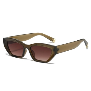 Cat eye sunglasses in olive green frames with gradient brown lenses for a retro look