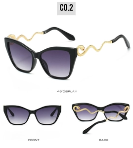 Detail of cat-eye sunglasses with gradient lenses and gold snake-shaped metal temples