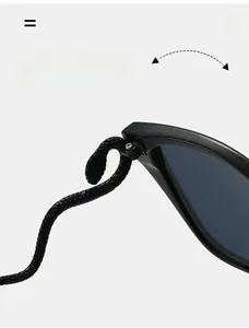 Detail of durable hinges and snake-shaped temples on black cat eye sunglasses